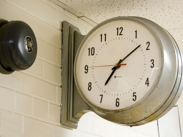 A clock with a ringing bell.